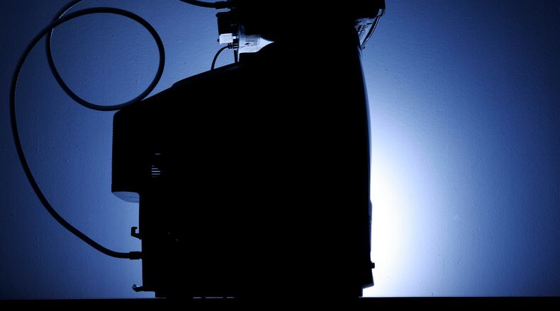 **ADVANCE FOR WEEKEND, JUNE 9-10** A cable box is seen on top of a television in Philadelphia, Wednesday, May 30, 2007. July 1, the Federal Communications Commission will force cable companies to comply with a set of rules designed to open the market for set-top boxes and other devices. (AP Photo/Matt Rourke) (AP file photo)