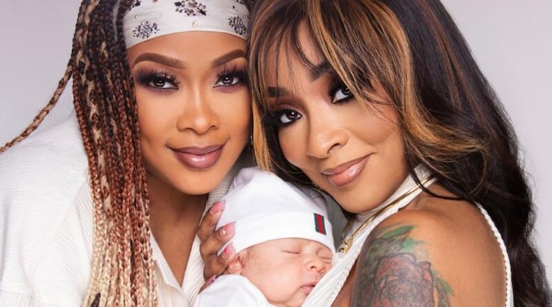Da Brat and Jesseca "Judy" Harris-Dupart with their baby True Legend. WE-TV