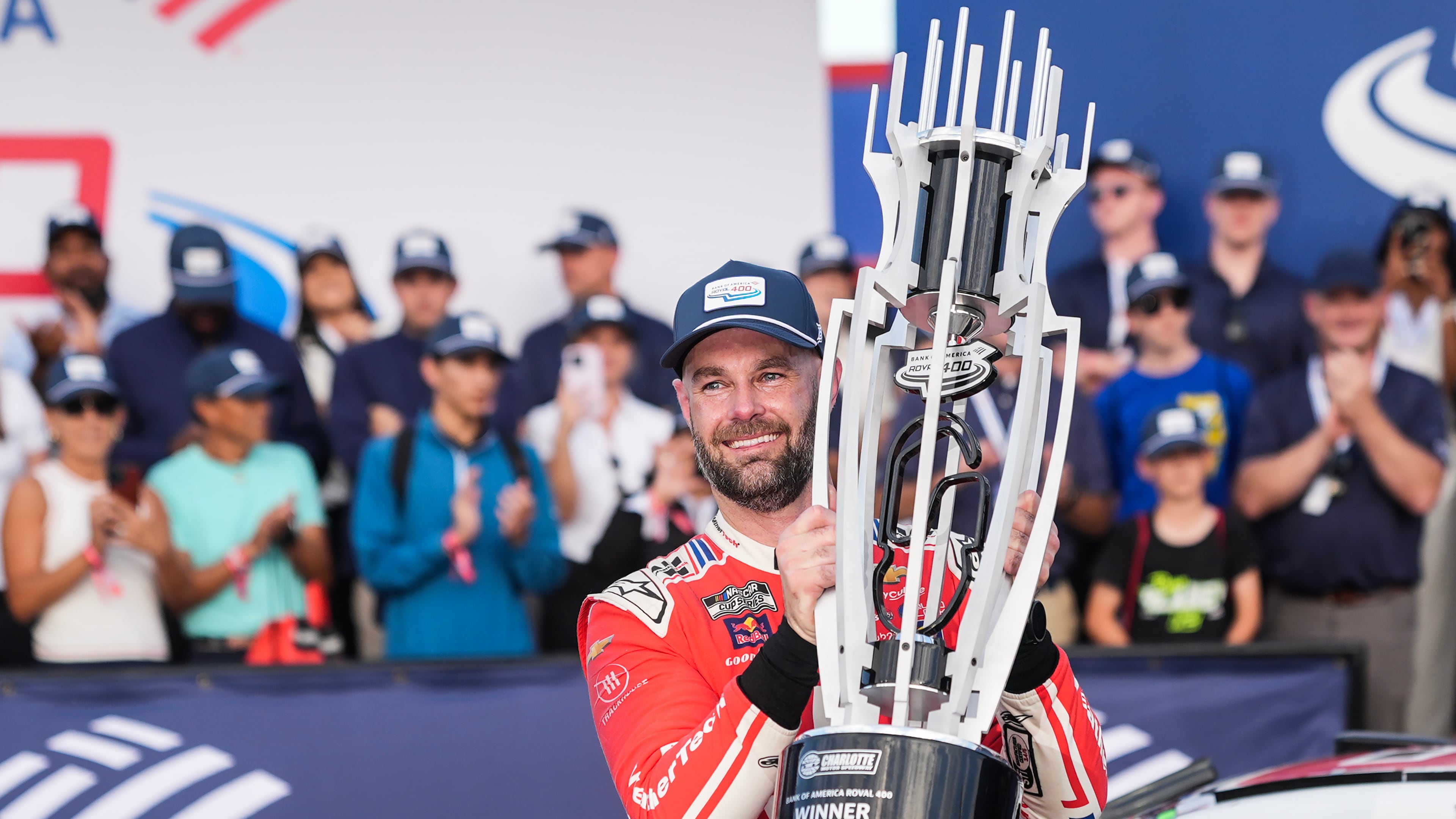 Shane van Gisbergen celebrates in Victory Lane after winning a NASCAR Cup Series auto race at Charlotte Motor Speedway, Sunday, Oct. 5, 2025, in Concord, N.C. (AP Photo/Matt Kelley)