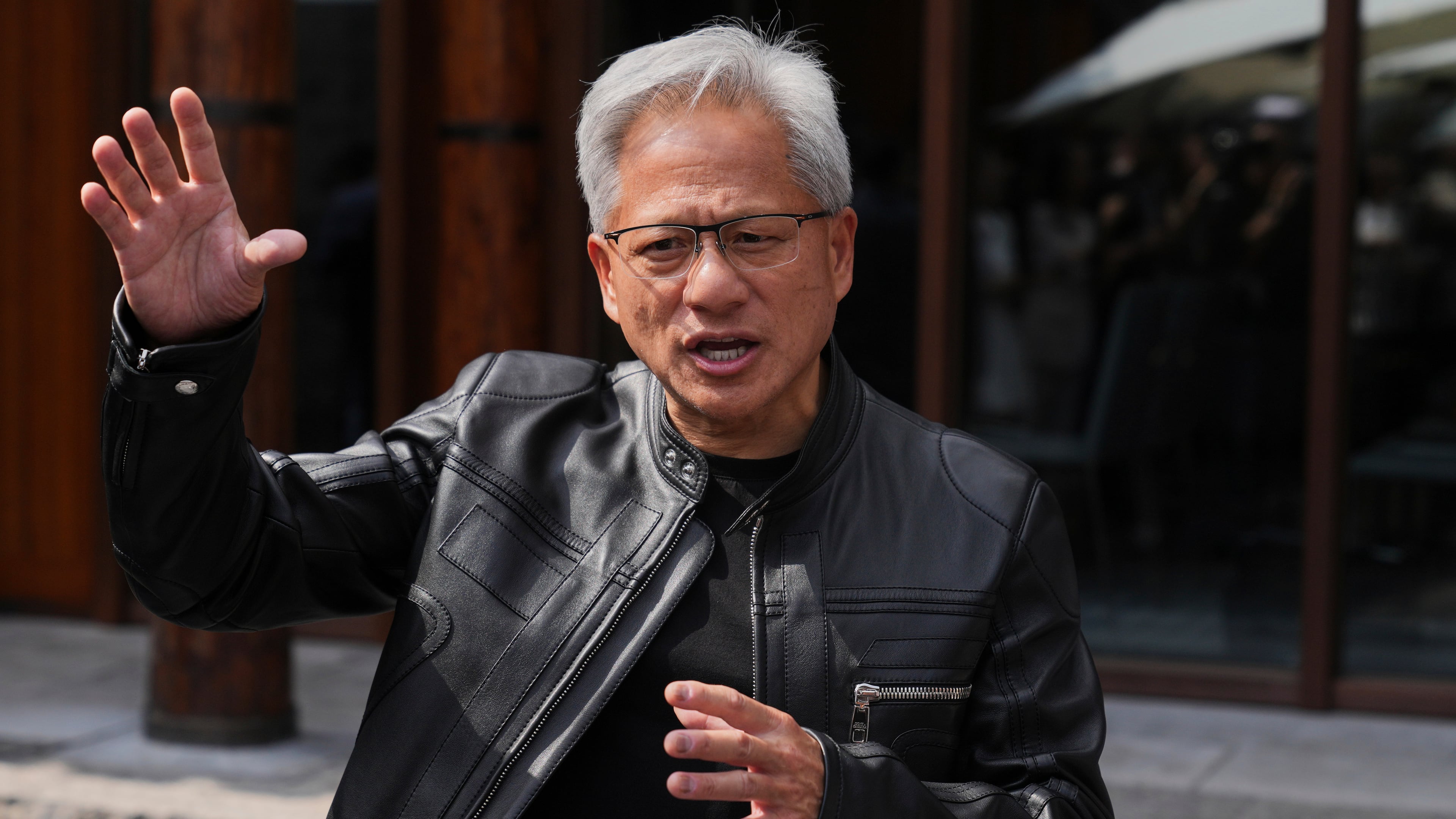 FILE - CEO of Nvidia Jensen Huang speaks during a press conference at the Mandarin Oriental Qianmen after attending the third China International Supply Chain Expo, in Beijing, July 16, 2025. (AP Photo/Andy Wong, File)