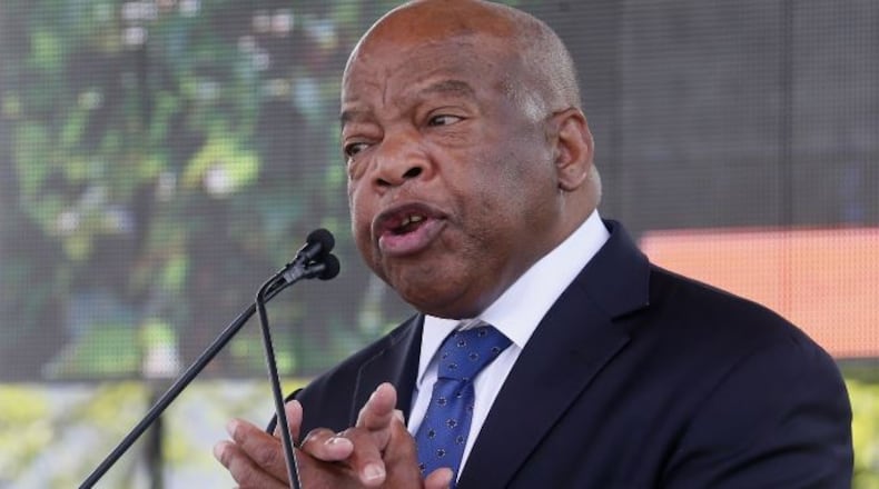 U.S. Rep. John Lewis, D-Atlanta, at the 2014 opening of the National Center for Civil and Human Rights in Atlanta. Bob Andres, bandres@ajc.com
