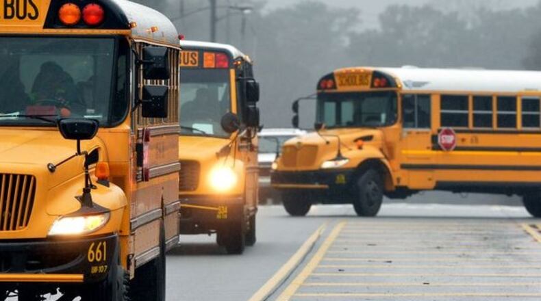 Georgia law requires school boards to maintain accreditation