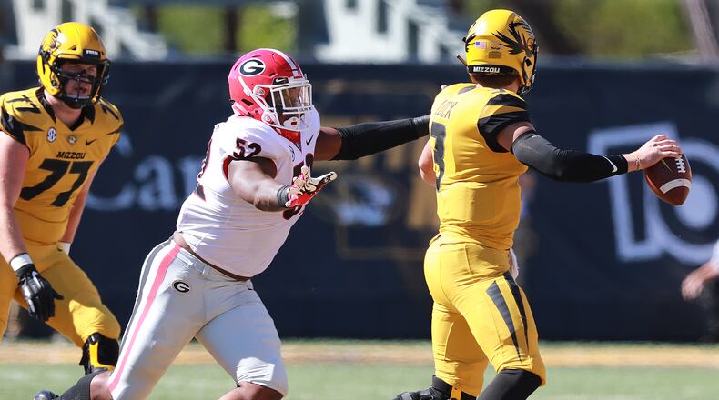 September 22, 2018 Columbia: Georgia defender Tyler Clark pressures Mizzou quarterback Drew Lock during the first half in a NCAA college football game on Saturday, Sept 22, 2018, in Columbia. Curtis Compton/ccompton@ajc.com