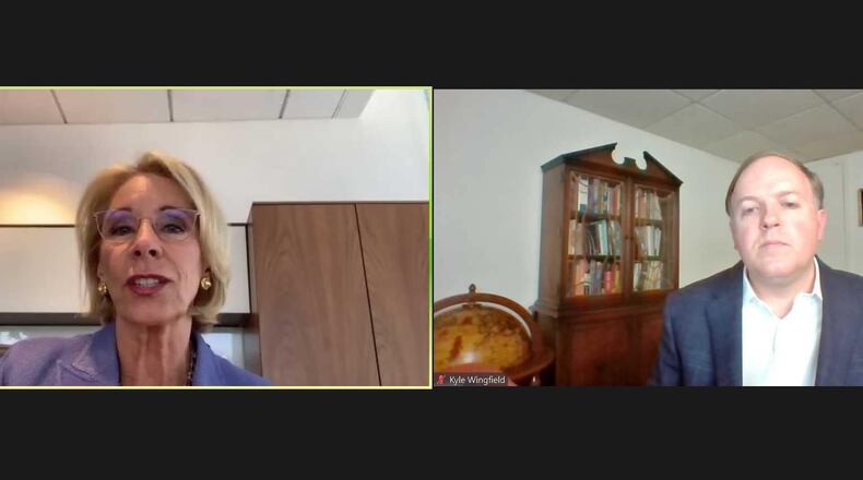 U.S. Secretary of Education Betsy DeVos (left) answers questions from Kyle Wingfield during a July 15, 2020 virtual question-and-answer session held by Wingfield's group, the Georgia Public Policy Foundation. ERIC STIRGUS/ESTIRGUS@AJC.COM
