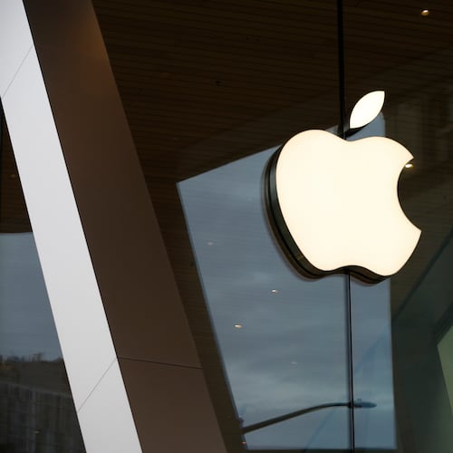 FILE - An Apple logo adorns the facade of the downtown Brooklyn Apple store on March 14, 2020, in New York. (AP Photo/Kathy Willens, File)