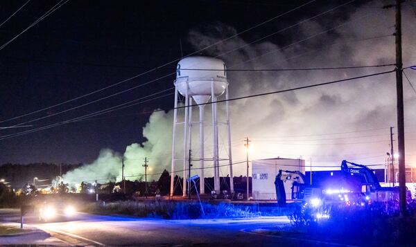 The plume of smoke rising from BioLab as seen from Old Covington Highway continued on Thursday, Oct. 3, 2024 in Conyers. A fire at the chemical plant in Conyers days earlier had agencies monitoring the air quality as crews tried to neutralize the site. (John Spink/AJC 2024)