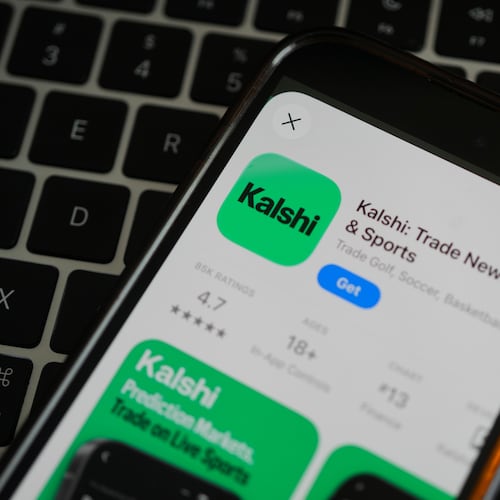 FILE - An ad for the prediction market app Kalshi is displayed on a mobile phone Thursday, April 16, 2026, in Chicago. (AP Photo/Erin Hooley, file)