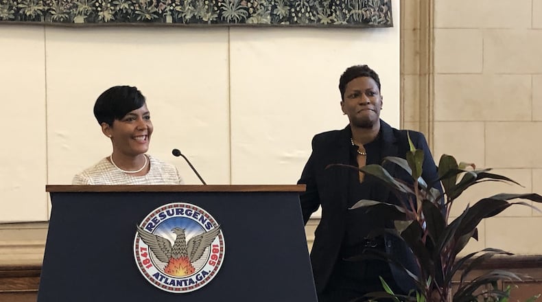 Atlanta Mayor Keisha Lance Bottoms, left, introduces Terri Lee, a longtime senior leader in the city’s planning department, as Atlanta’s first chief housing officer on Tuesday, Oct. 16, 2018. J. SCOTT TRUBEY/STRUBEY@AJC.COM