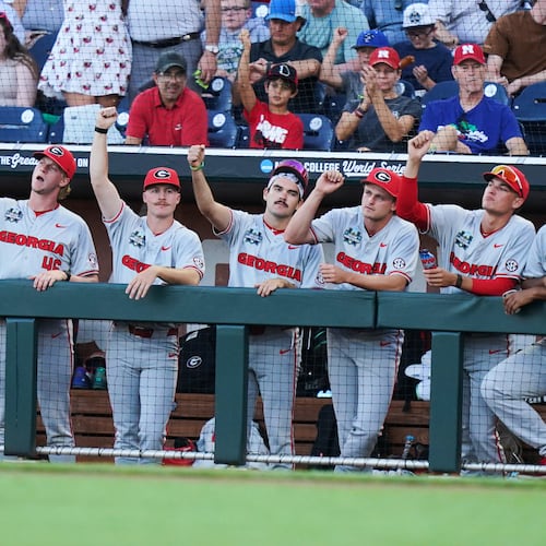 The Bulldogs cheer in the dugout during their College World Series game against Oklahoma on Monday, June 15, 2026 in Omaha, Neb. Georgia got its 13th transfer portal pickup Friday evening. (Vera Nieuwenhuis/AP)