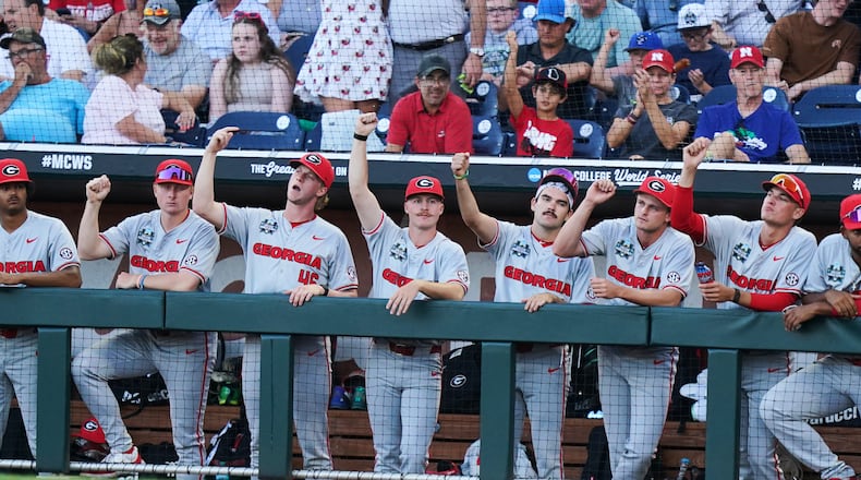 The Bulldogs cheer in the dugout during their College World Series game against Oklahoma on Monday, June 15, 2026 in Omaha, Neb. Georgia got its 13th transfer portal pickup Friday evening. (Vera Nieuwenhuis/AP)