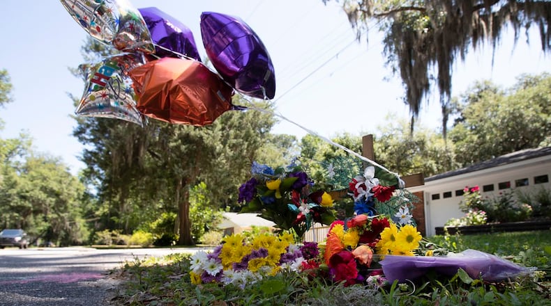 A memorial at the spot where Ahmaud Arbery was shot and killed is shown Friday, May 8, 2020, in Brunswick, Ga.
