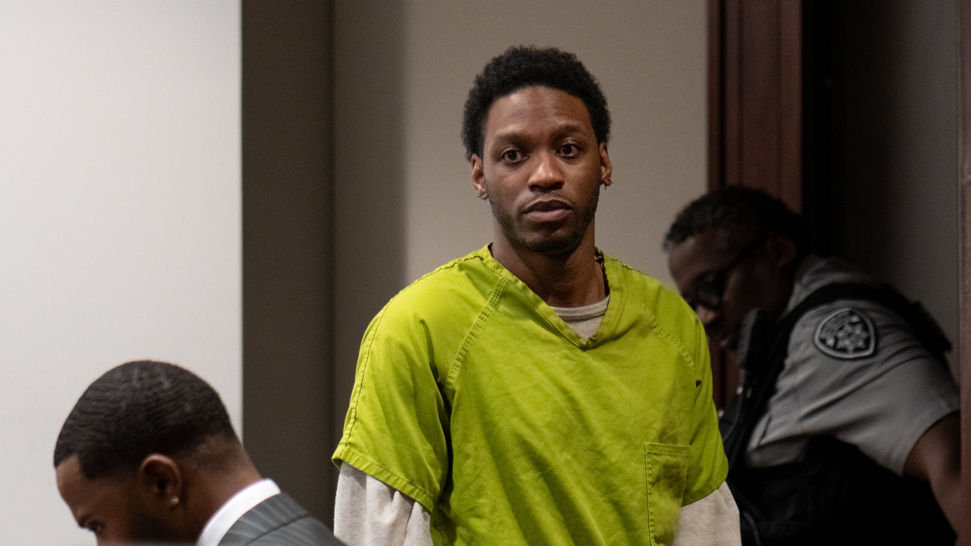 Kashman Thomas enters a Cobb County courtroom for a sentencing hearing on Thursday, Nov. 13, 2025, after pleading guilty to a reduced charge in a 2019 shooting that left a Kennesaw State University student dead and two others injured. (Ben Hendren for the AJC)