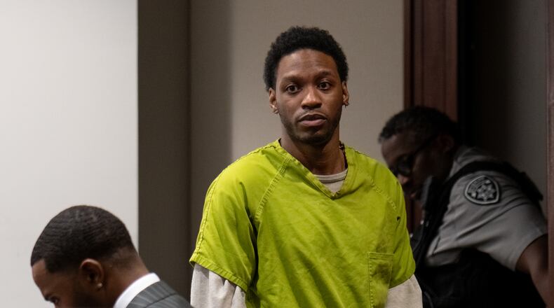 Kashman Thomas enters a Cobb County courtroom for a sentencing hearing on Thursday after pleading guilty to a reduced charge in a 2019 shooting that left a Kennesaw State University student dead and two others injured. (Ben Hendren for the AJC)
