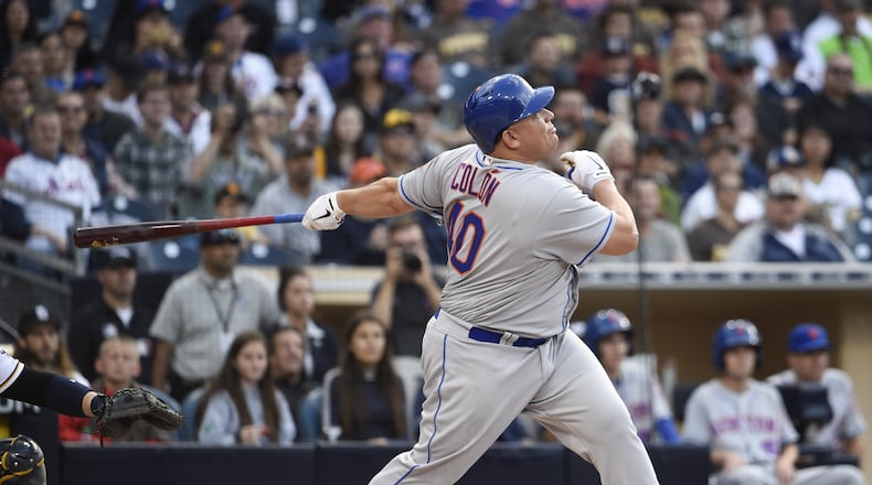 Bartolo Colon belts a home run for the Mets at San Diego on May 7. (Photo by Denis Poroy/Getty Images)