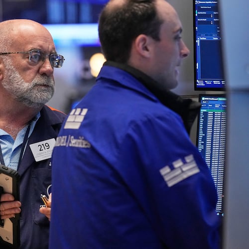 Trader Joseph Stevens, left, works on the floor of the New York Stock Exchange, Tuesday, May 5, 2026. (AP Photo/Richard Drew)
