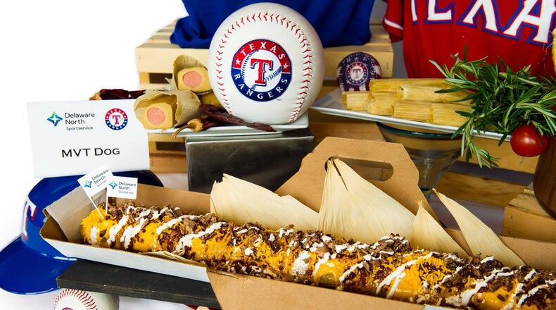 Meet the Most Valuable Tamale (M.V.T.): A 2-ft tamale filled with the legendary Boomstick hot dog, topped with Texas chili and nacho cheese. Served at Globe Life  Park in Arlington. (Courtesy of Delaware North)