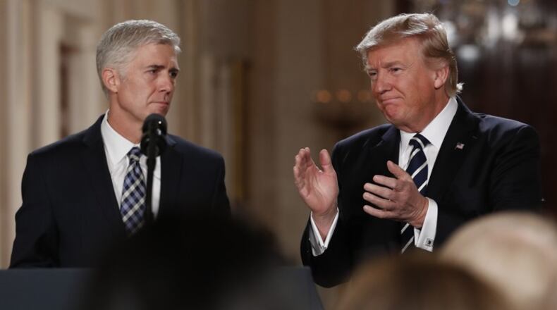 President Donald Trump announces Judge Neil Gorsuch as his nominee to the Supreme Court. in January. Trump announced 10 new federal court appointments on Monday. (AP Photo / Carolyn Kaster)