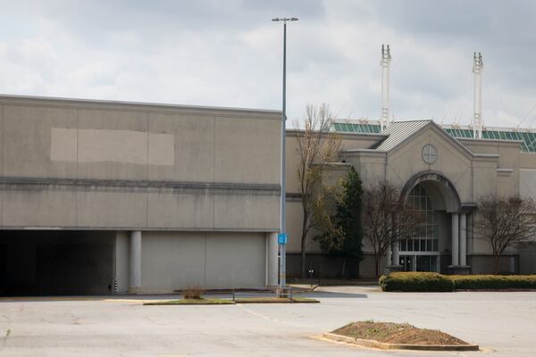 An empty department store is shown at the North Point Mall. (Jason Getz / AJC)