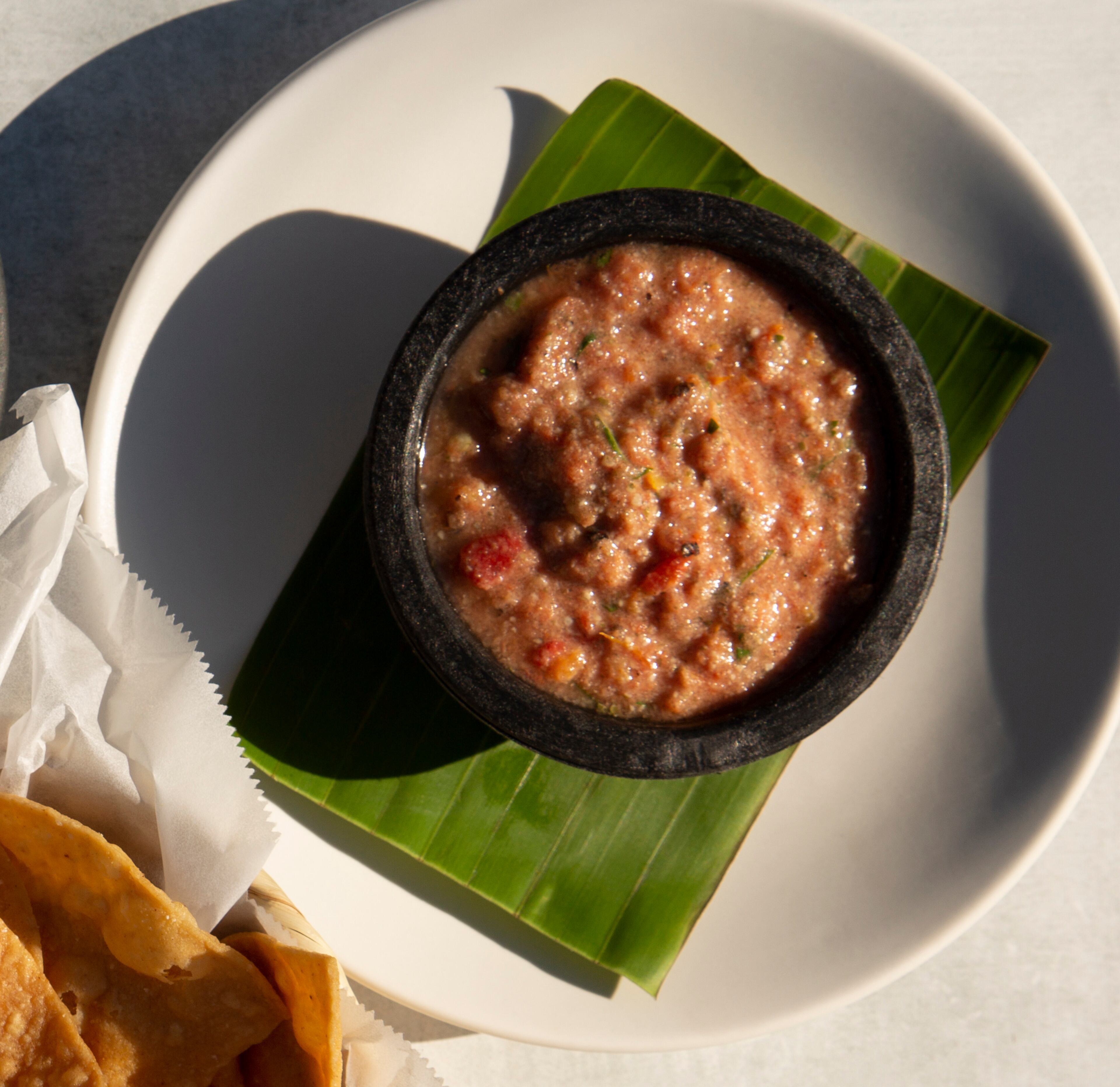 Sikil Pak is a rustic, spicy salsa based on an ancient Mayan recipe made of charred tomatoes and toasted pumpkin seeds that is served with chips at La Semilla. (Courtesy of La Semilla)