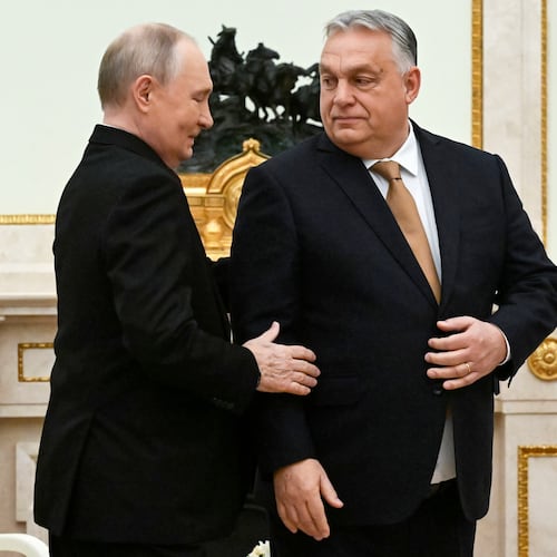 Russian President Vladimir Putin, left, speaks with Hungarian Prime Minister Viktor Orban during their meeting at the Senate Palace of the Kremlin in Moscow, Russia, Friday, Nov. 28, 2025. (Alexander Nemenov/Pool Photo via AP)