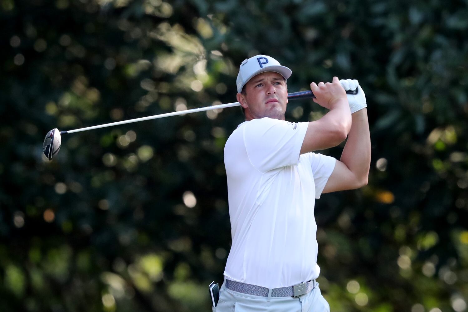 April 7, 2021, Augusta: Bryson DeChambeau hits his tee shot on the eleventh hole during his practice round for the Masters at Augusta National Golf Club on Wednesday, April 7, 2021, in Augusta. Curtis Compton/ccompton@ajc.com
