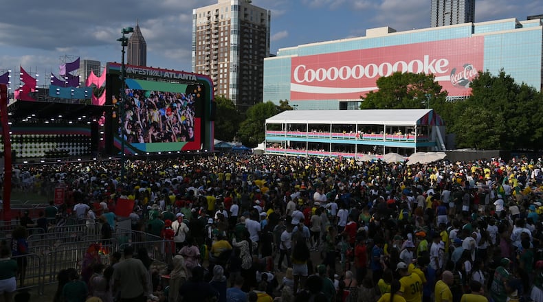 Soccer fans gather to watch a match between Brazil and Scotland at the FIFA Fan Festival in Centennial Olympic Park on Wednesday, June 24, 2026, in Atlanta. (Hyosub Shin/AJC)