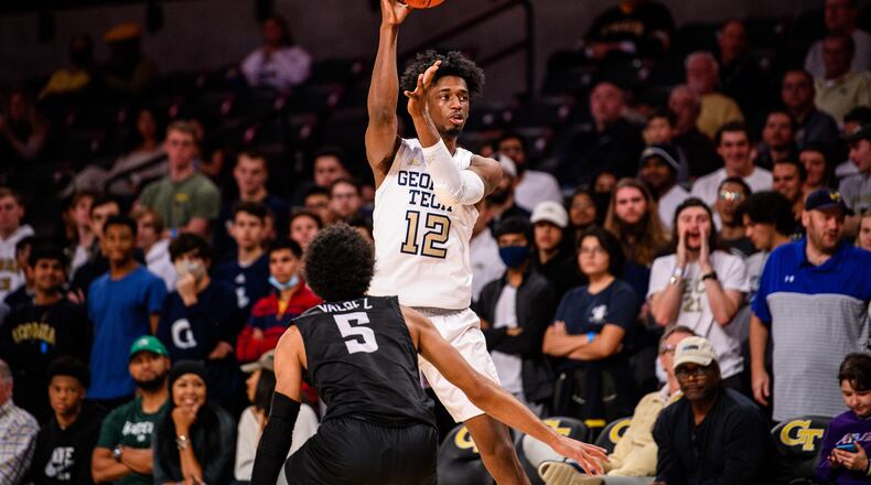 Georgia Tech forward Khalid Moore looks to pass in a game against Stetson, Nov. 12, 2021 at McCamish Pavilion. (Danny Karnik/Georgia Tech Athletics)