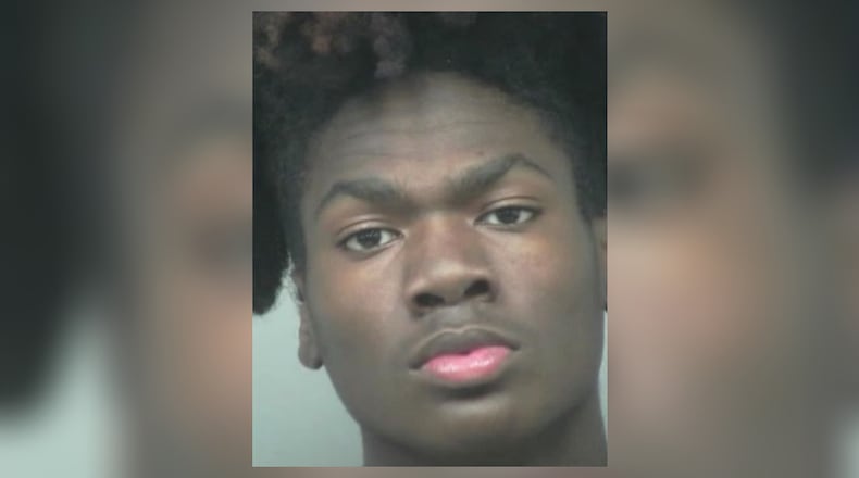 This is a prior mugshot of Emmanuel Holcomb, who is wanted by Duluth police.