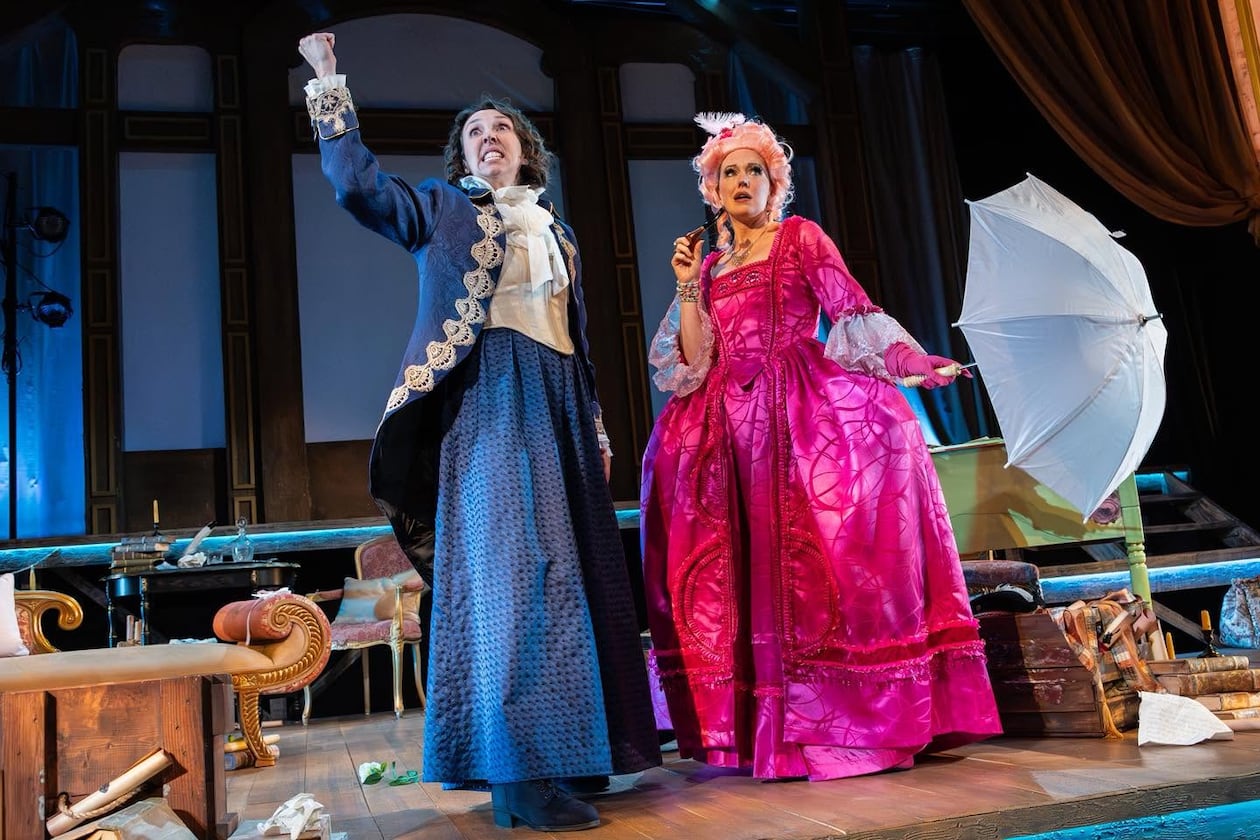 Theatrical Outfit will stage “The Revolutionists,” an irreverent comedy set during the French Revolution’s Reign of Terror, through Sunday, June 28, at the Balzer Theater at Herren’s. Pictured are cast members Courtney Patterson (left) and Bethany Anne Lind. (Courtesy of Theatrical Outfit)