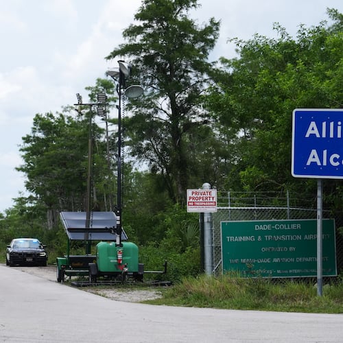 A Florida Highway Patrol car guards the entrance to the "Alligator Alcatraz" detention center Monday, May 11, 2026, in Ochopee, Fla. (AP Photo/Marta Lavandier)