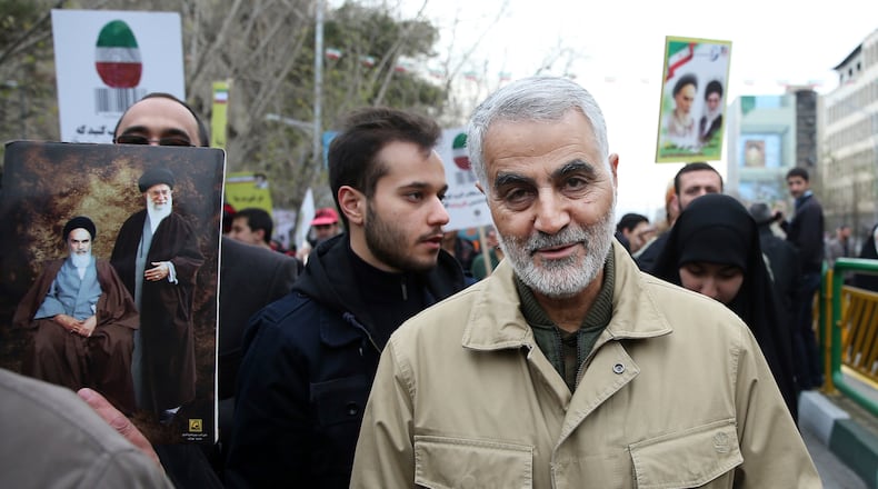 FILE - In this Thursday, Feb. 11, 2016, file photo, Qassem Soleimani, commander of Iran's Quds Force, attends an annual rally commemorating the anniversary of the 1979 Islamic revolution, in Tehran, Iran. The U.S. airstrike that killed a prominent Iranian general in Baghdad raises tensions even higher between Tehran and Washington after months of trading attacks and threats across the wider Middle East. (AP Photo/Ebrahim Noroozi, File)