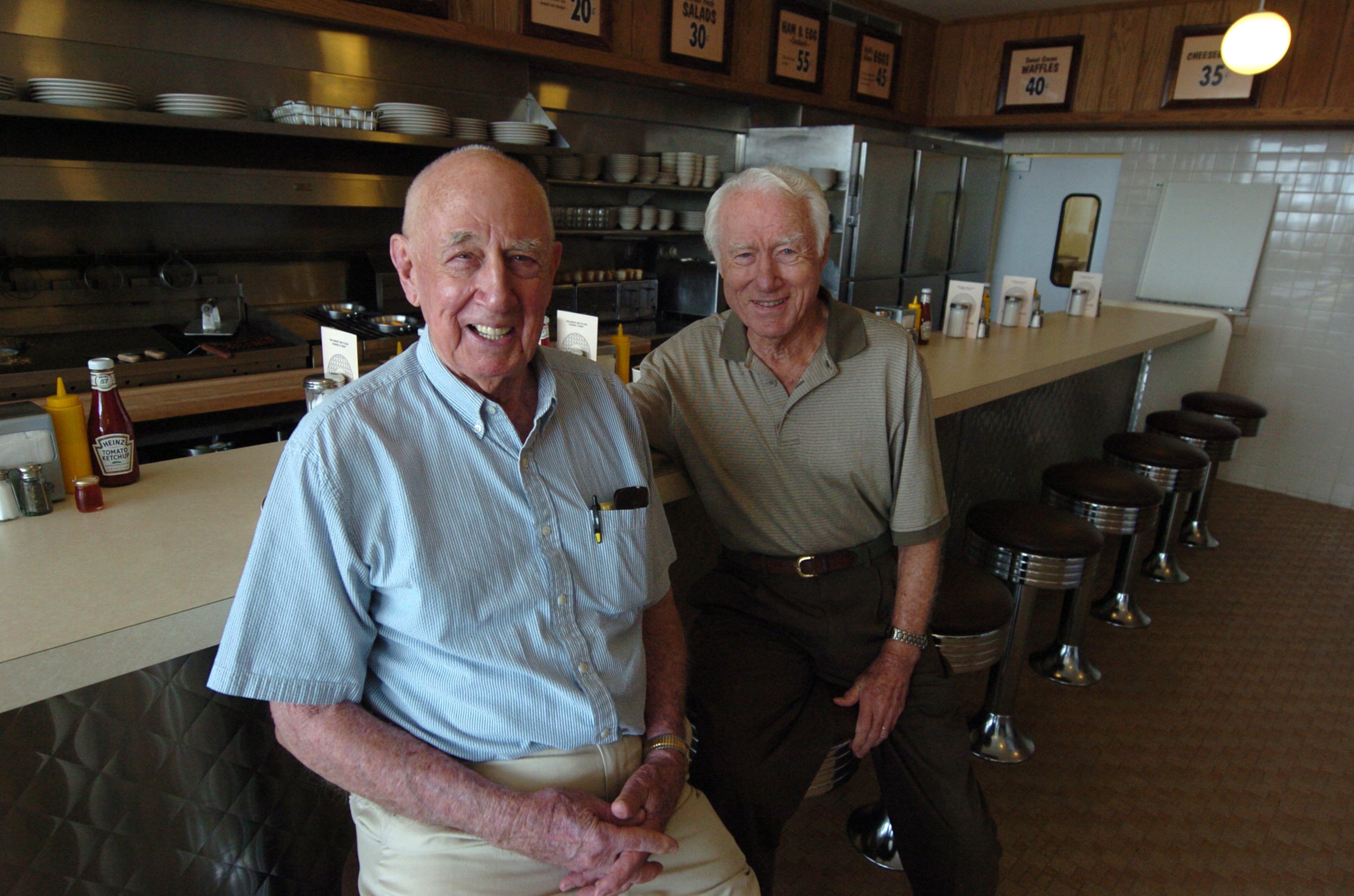 Joe Rogers Sr., at left, and Tom Forkner in 2008 when the site of the first Waffle House reopened as a museum. (Frank Niemeir/AJC)