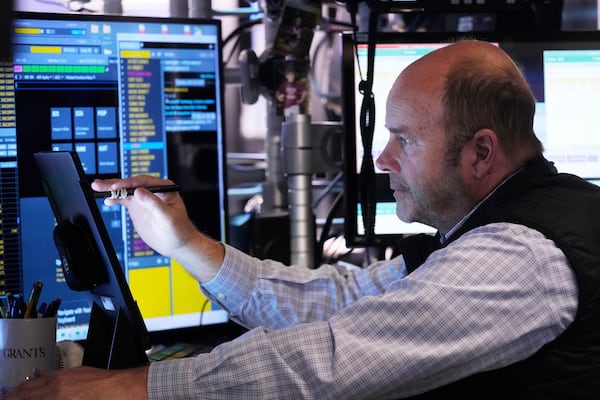 Trader Peter Mancuso works on the floor of the New York Stock Exchange, Tuesday, April 29, 2025. (AP Photo/Richard Drew)