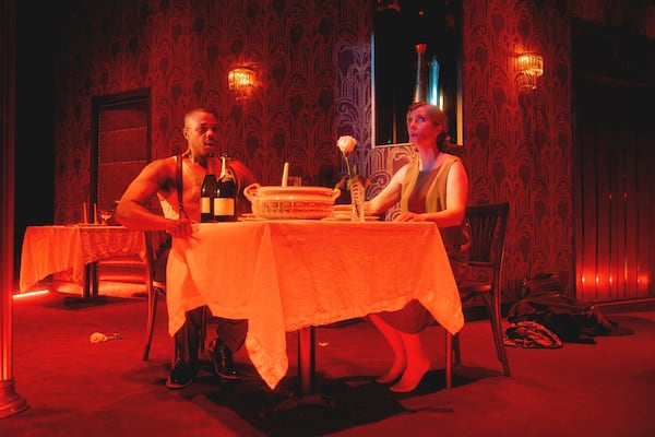 This photo provided by Lincoln Center for the Performing Arts shows Davóne Tines, left, as Jim, and Kiera Duffy, as Julia, in a scene from "The Comet/Poppea" in the Run AMOC* Festival at Lincoln Center, June 17, 2025, in New York. (Lawrence Sumulong/Lincoln Center for the Performing Arts via AP)