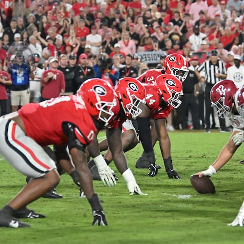 Georgia and Alabama line up at the line of scrimmage at Sanford Stadium on Saturday, Sept. 27, 2025, in Athens. The No. 3-ranked Bulldogs and the No. 9-ranked Crimson Tide have had plenty to handle leading up to the SEC championship game. (Hyosub Shin/AJC)