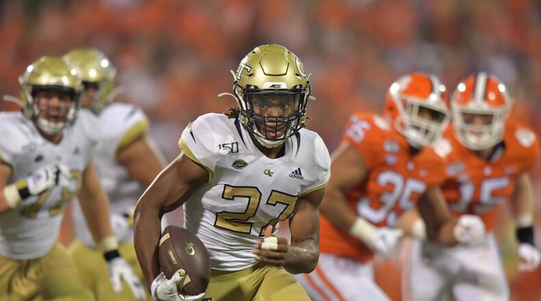 Georgia Tech running back Jordan Mason (27) runs with the ball in the second half at Memorial Stadium on the Clemson University campus in Clemson, S.C. on Thursday, August 29, 2019. Clemson won 52-14 over the Georgia Tech. (Hyosub Shin / Hyosub.Shin@ajc.com)