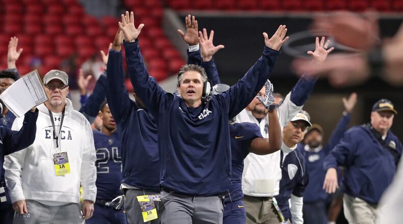 Eagle's Landing Christian head coach Jonathan Gess reacts to a touchdown in the first half during their game against Athens Academy in the Class A Private Championship Friday, Dec. 8, 2017, at Mercedes-Benz Stadium in Atlanta.