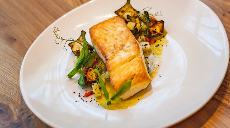 Noble Fin in Peachtree Corners is a new seafood concept where fresh market fish dishes, like this halibut, offer a true coastal dining experience. Read more about Noble Fin and 24 hours of eating in Gwinnett.(Photo credit: Noble Fin)