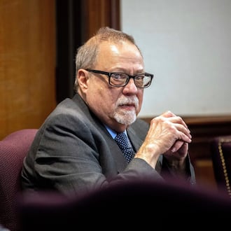 Greg McMichael looks at the gallery during the testimony of his son, Travis McMichael's in the trial of he, his son and William "Roddie" Bryan in the Glynn County Courthouse on Nov. 16, 2021. (AP Photo/Stephen B. Morton, Pool, File)