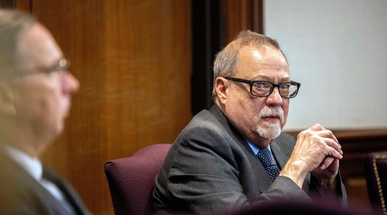 Greg McMichael looks at the gallery during the testimony of his son, Travis McMichael's in the trial of he, his son and William "Roddie" Bryan in the Glynn County Courthouse on Nov. 16, 2021. (AP Photo/Stephen B. Morton, Pool, File)