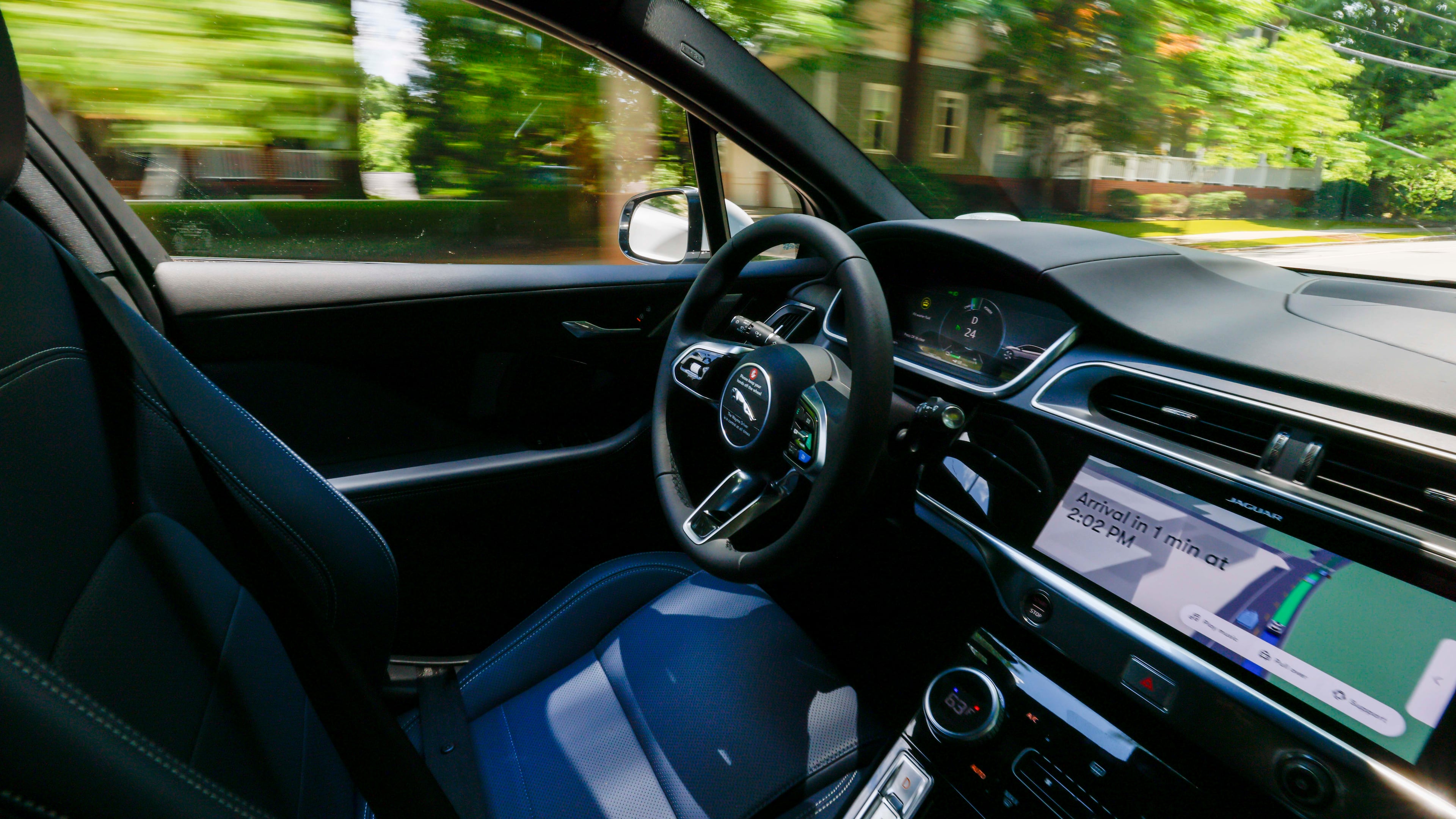 A photograph of a self-driving Waymo vehicle in motion on Monday, June 23, 2025.
(Miguel Martinez/AJC)