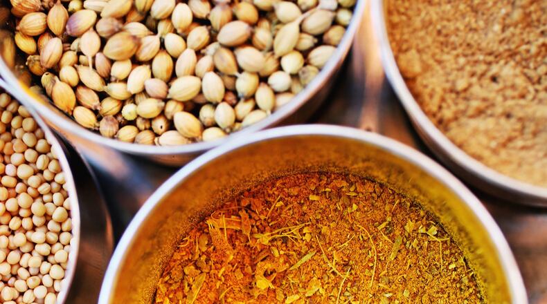The spices you will need to begin your Indian cooking journey are; coriander, cumin, turmeric, mustard seeds (yellow and black), cinnamon, fennel, ginger, red chili, cardamom, clove and fenugreek leaves. (Juli Leonard/Raleigh News & Observer/TNS)