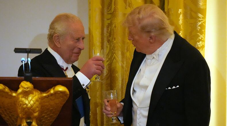 Britain's King Charles III toasts with President Donald Trump during a State Dinner with first lady Melania Trump and Queen Camilla in the East Room of the White House State Dinner Tuesday, April 28, 2026, in Washington. (AP Photo/Alex Brandon)