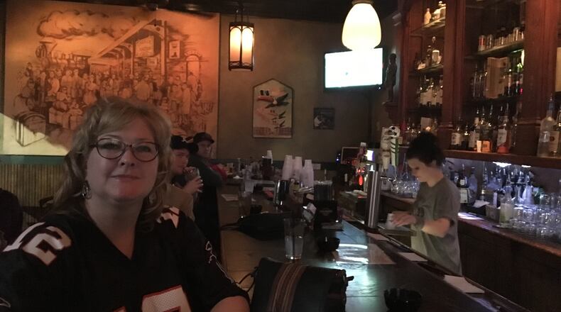 Atlanta Falcons fan Tina Wootan says the city has rallied around the team as it heads to the Super Bowl after defeating the Green Bay Packers. MARK NIESSE / MARK.NIESSE@AJC.COM