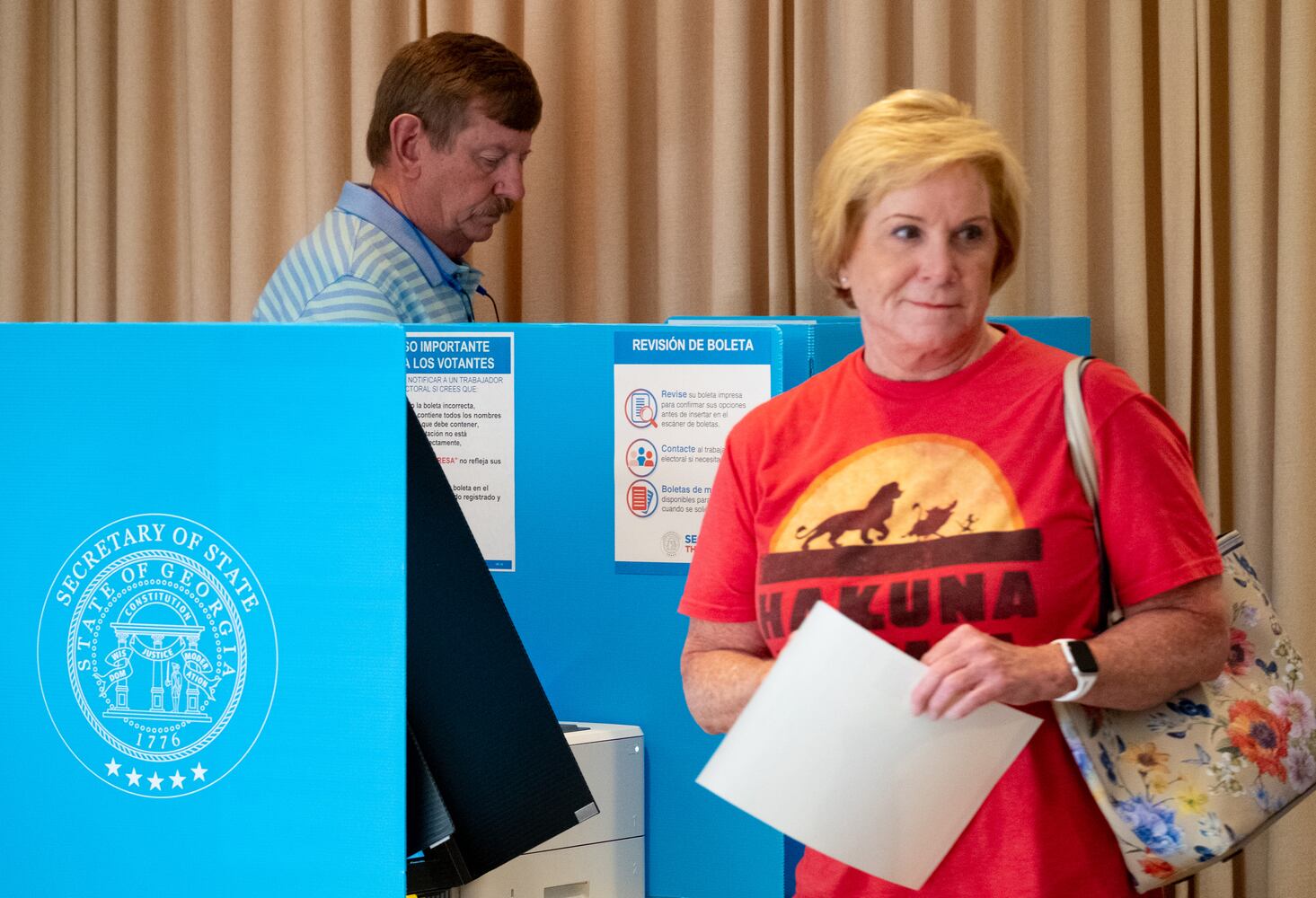 220621-Peachtree Corners-Joe and Nancy McCord vote at Unity Atlanta Church in Peachtree Corners on Tuesday, June 21, 2022, during the primary runoff. The location was being used temporarily because of construction at their usual polling location of Peachtree Elementary School. Ben Gray for the Atlanta Journal-Constitution