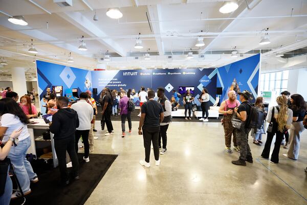 Attendees make their way through the booths of various tech companies at the Render ATL Tech conference, held at Americas Mart. The forum has experienced extraordinary progress over three years, with attendance skyrocketing from 300 guests to over 2,000.
(Miguel Martinez / AJC)