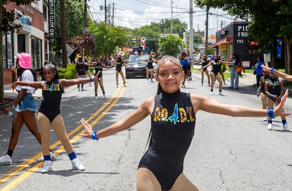Jaida Rachelle performs in the Juneteenth Atlanta Parade on Monroe Drive in Atlanta on Saturday. (Jenni Girtman for the AJC)