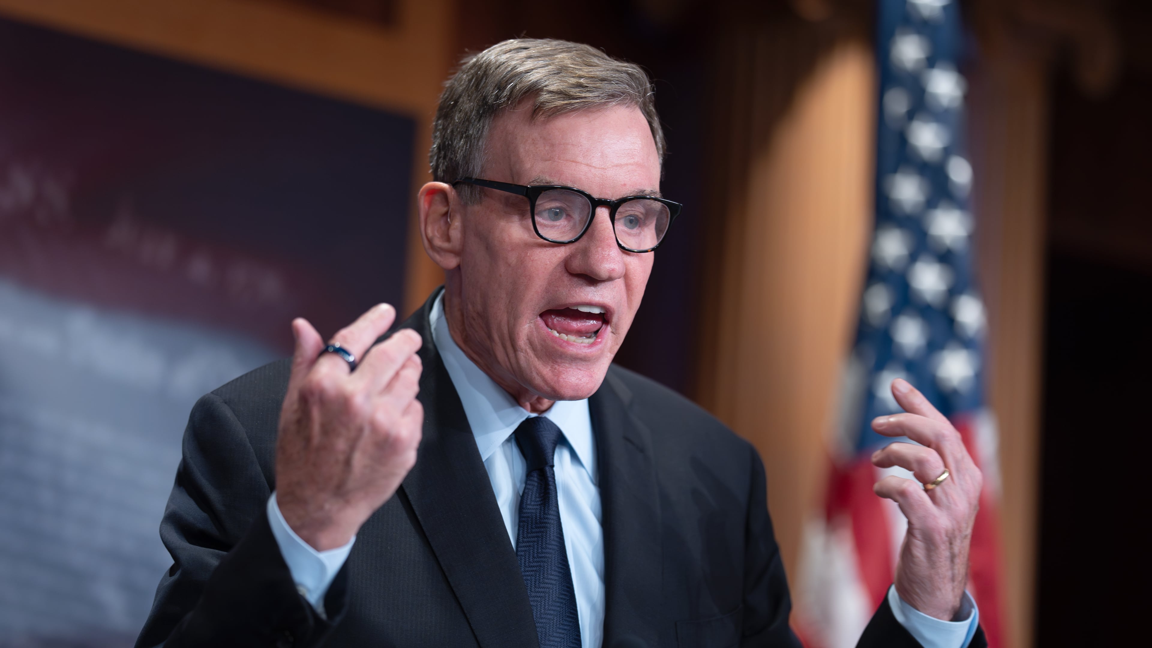 FILE - Sen. Mark Warner, D-Va., the top Democrat on the Senate Intelligence Committee, speaks about the Trump administration following reports that only Republican lawmakers received security briefings on the Trump-ordered military strikes against boats in the Caribbean, during a news conference at the Capitol in Washington, Thursday, Oct. 30, 2025. (AP Photo/J. Scott Applewhite, File)