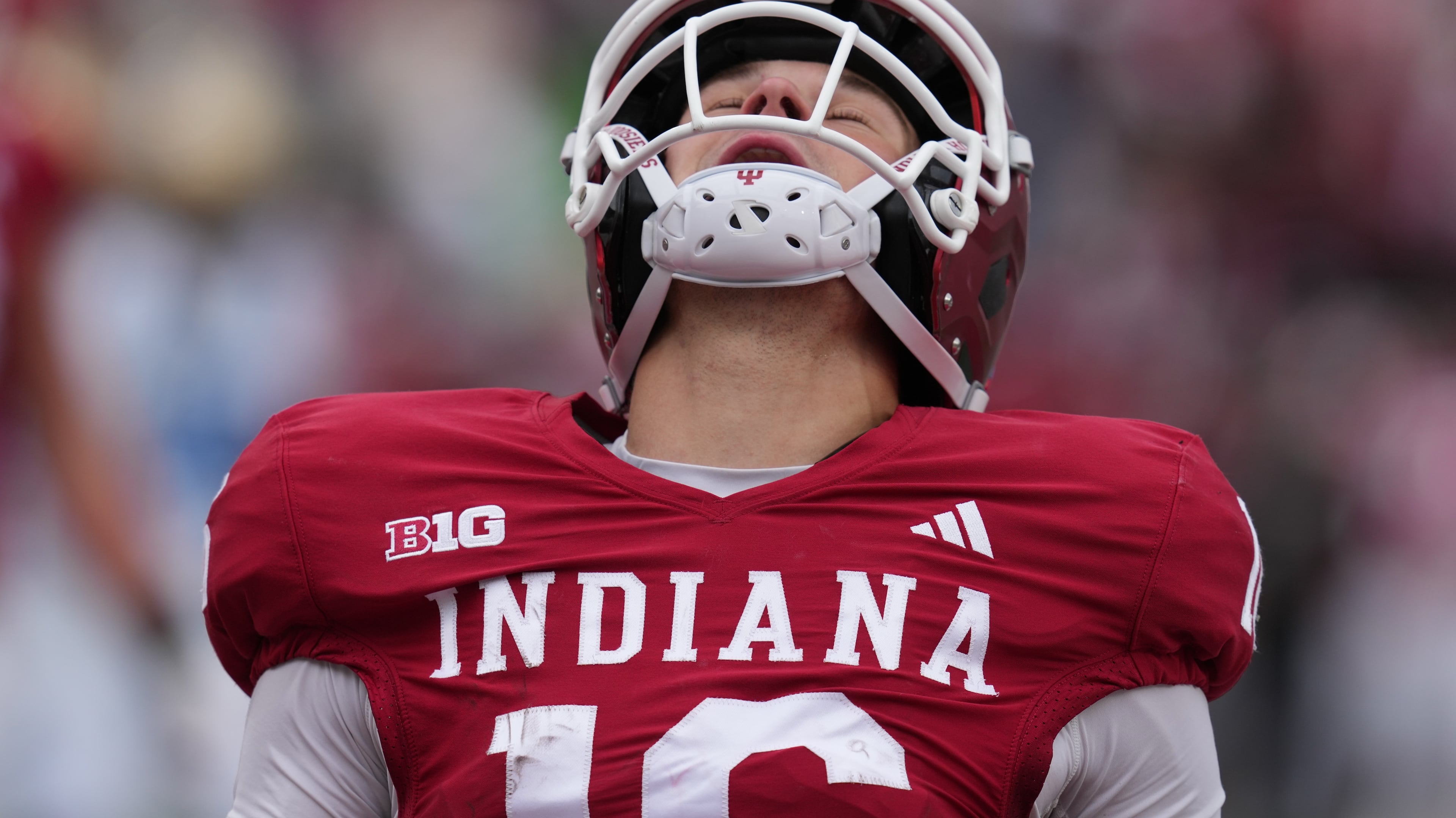 Indiana quarterback Alberto Mendoza (16) reacts after rushing for a touchdown during the second half of an NCAA college football game against UCLA, Saturday, Oct. 25, 2025, in Bloomington, Ind. (AP Photo/Darron Cummings)