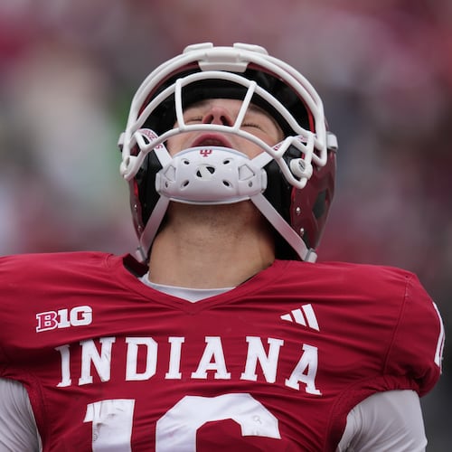 Indiana quarterback Alberto Mendoza (16) reacts after rushing for a touchdown during the second half of an NCAA college football game against UCLA, Saturday, Oct. 25, 2025, in Bloomington, Ind. (AP Photo/Darron Cummings)